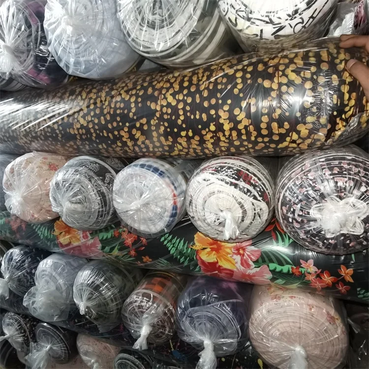 China 140-180 Polyester DTY Brushed Four Way Stretch Knit Printed Stock Fabric For Garment