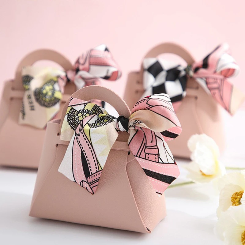 Розовая сумка из искусственной кожи с лентой