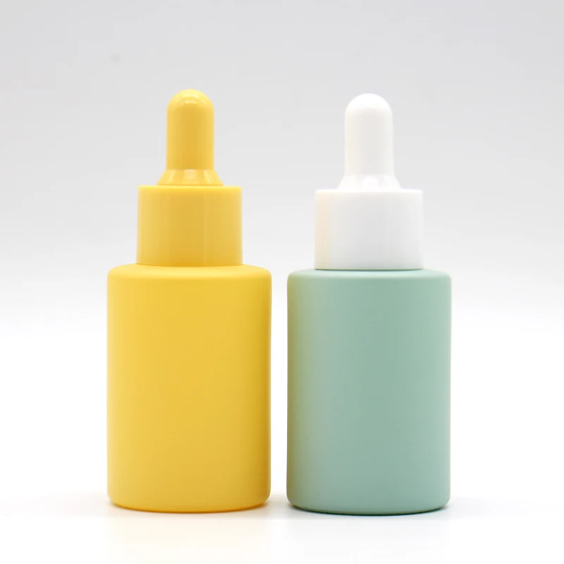 Customize 30ml cosmetic perfume essence 1oz 2oz  frosted glass essential oil pink dropper bottle dropper with box packaging