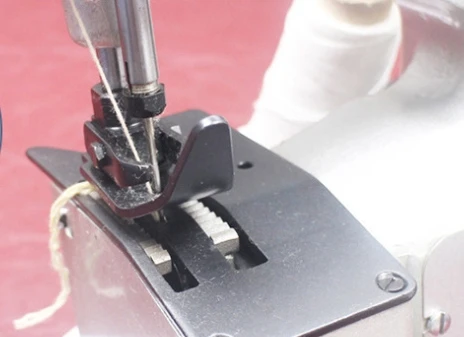 Handheld sewing machine