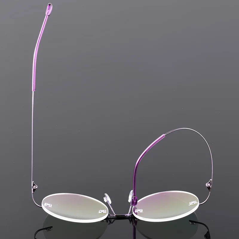 2024 New arrivals retro round rimless memory titanium flexible unisex eyeglasses fashion glasses men women
