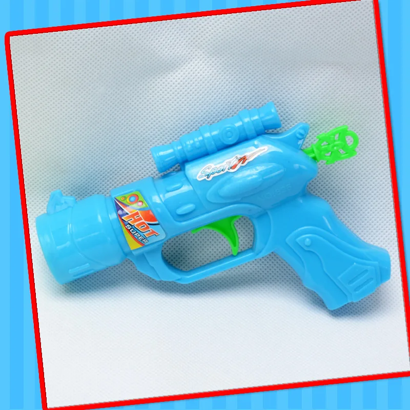 2022 cheap toy of plastic gun toy with candy best selling in supermarket shooting pingpong gun orange green color