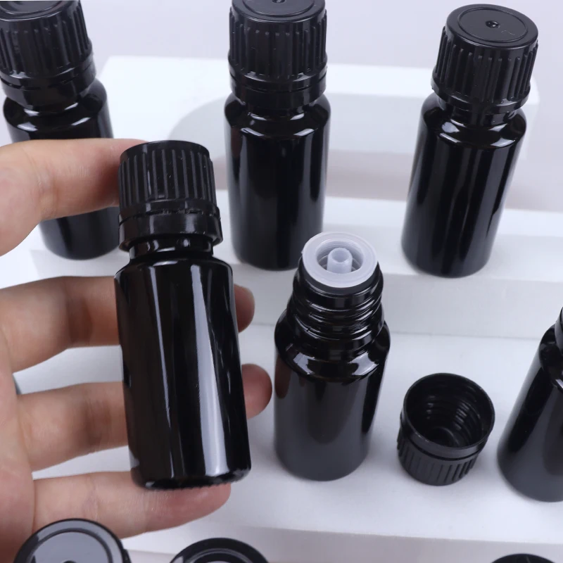 Cosmetic Packaging Matte Black Cosmetic 10ML Essential Oil Bottle With Plastic Screw Cap