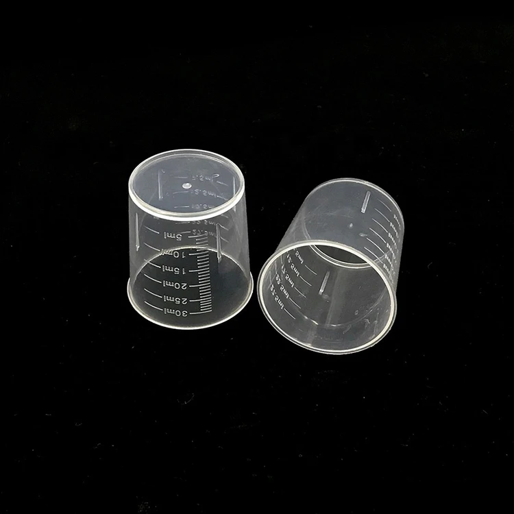 Factory stock can be customized 30ml plastic liquid measuring cup with scale
