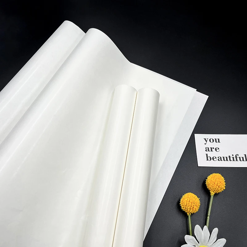 Manufacturer wholesale custom tissue paper pure wrapping paper white kraft wrap paper roll for gift box packaging