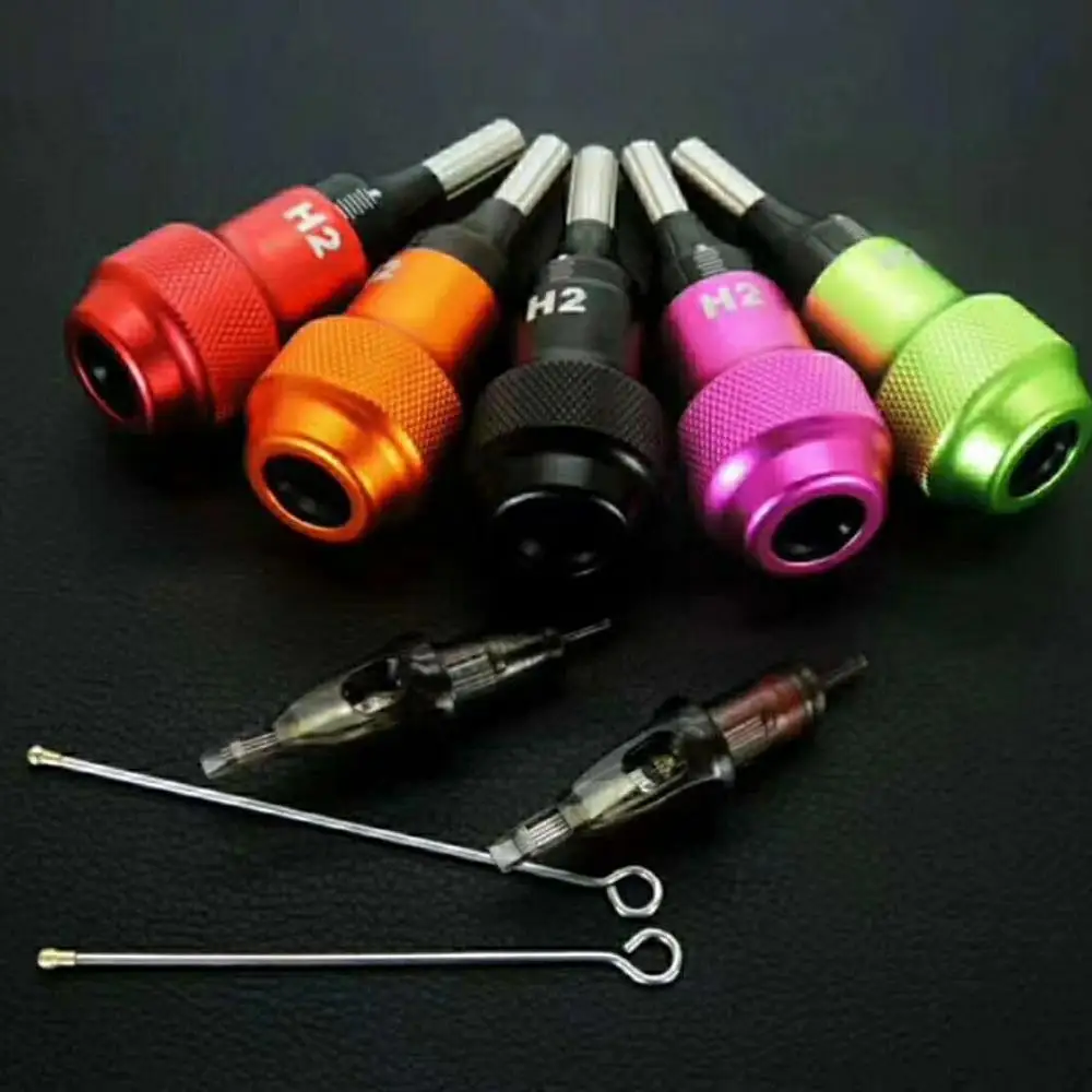 Tattoo metal tube and disposable tube grip with tattoo tip