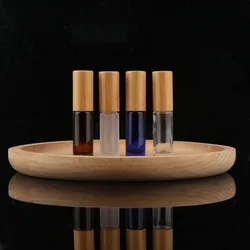 Оптовая продажа, прозрачный многоразовый стеклянный рулон эфирного масла на бутылке с бамбуковой крышкой