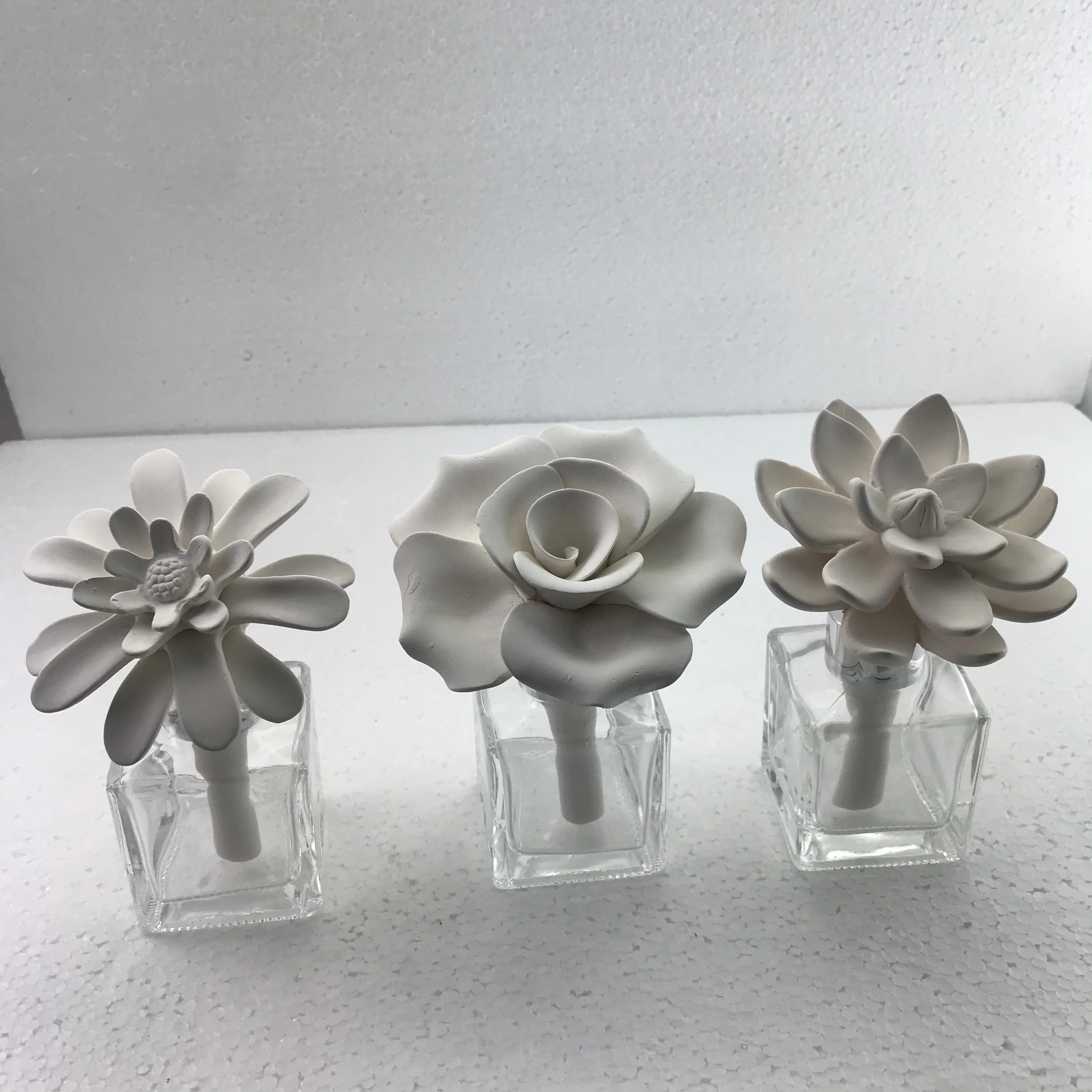 Hot Sell Ceramic Aroma Scent  Clay  Stone Ceramic Flower Diffuser Glass Bottle Reed Air Freshener