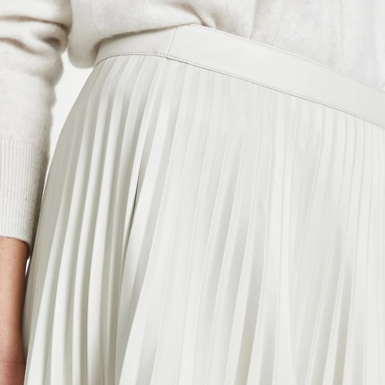 Factory wholesale ladies high waist solid skirts custom faux leather pleated detail midi women skirts casual