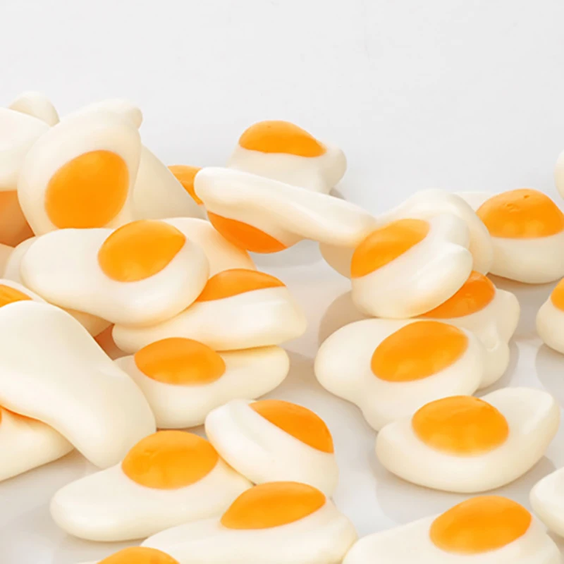 2022 Hot Sale Fruity Orange Flavored Easter Day Unique Delicious Jelly Candy Mini Egg Shaped Gummy Candy