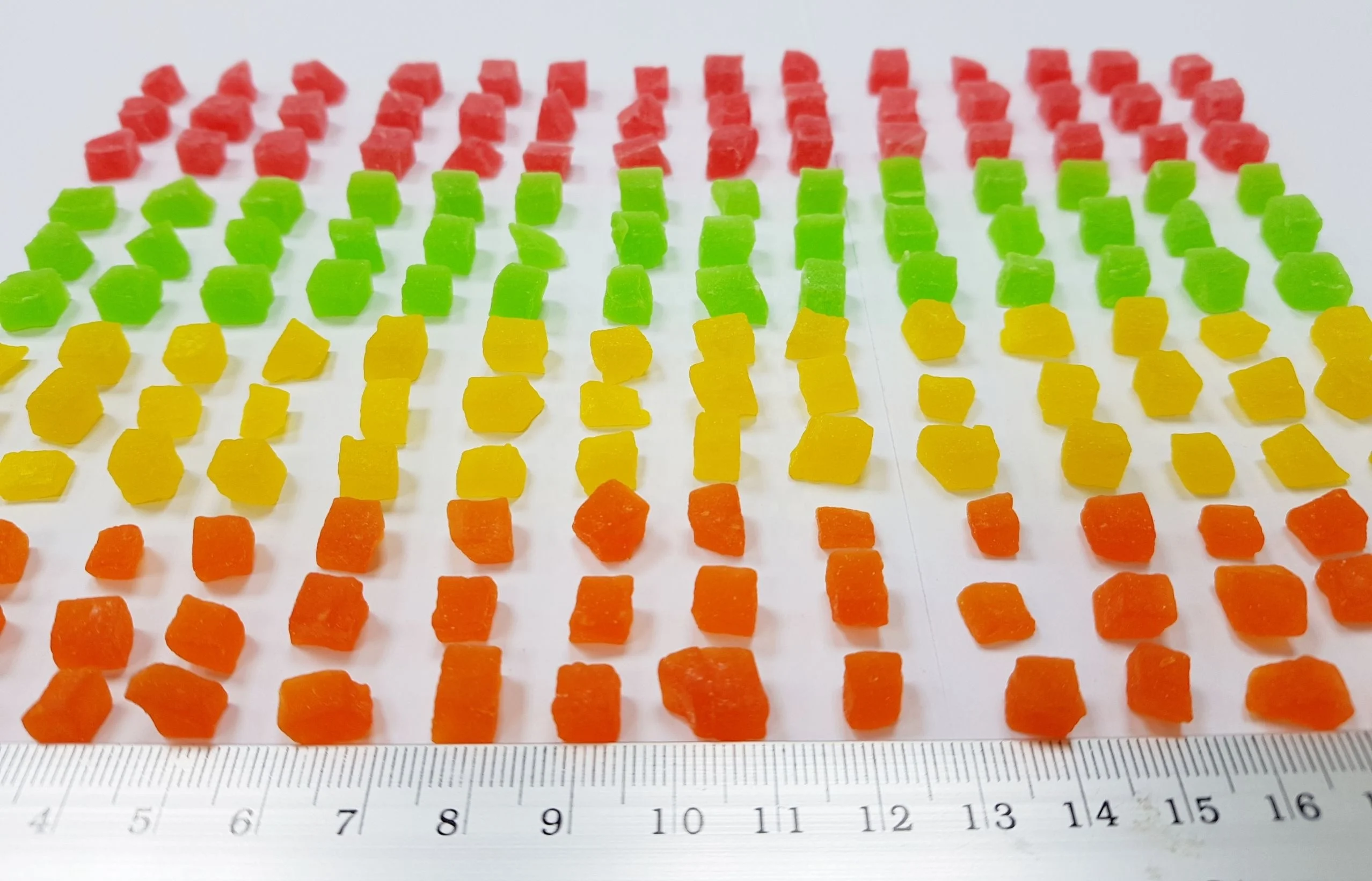 Dried candied Papaya dices 5-7 mm mixed colors added Thailand