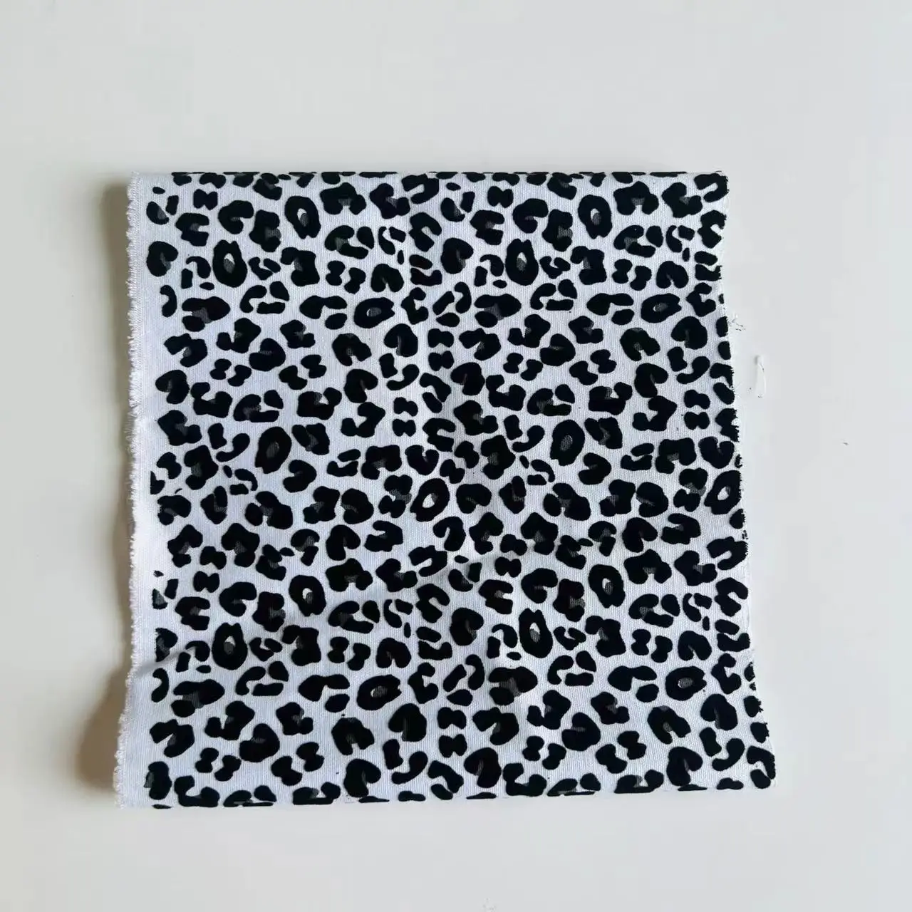 Fashionable leopard pattern flocked cotton canvas fabric for canvas bag drawstring bag
