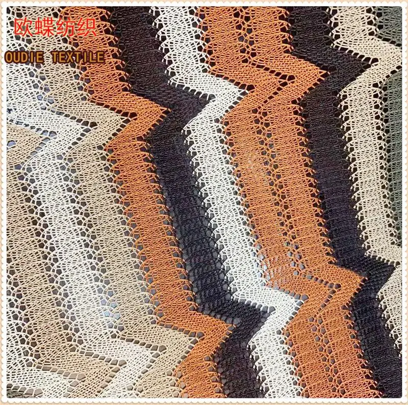 The manufacturer directly provides polyester yarn dyed blended polyester bright silk mesh knitted clothing fabric