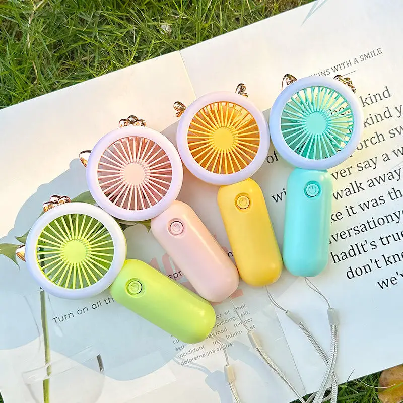 In stock Summer Small Pocket Cartoon Mini Fan Portable handheld Fan Cartoon Silent Night Light Mini Led Fan For Outdoor