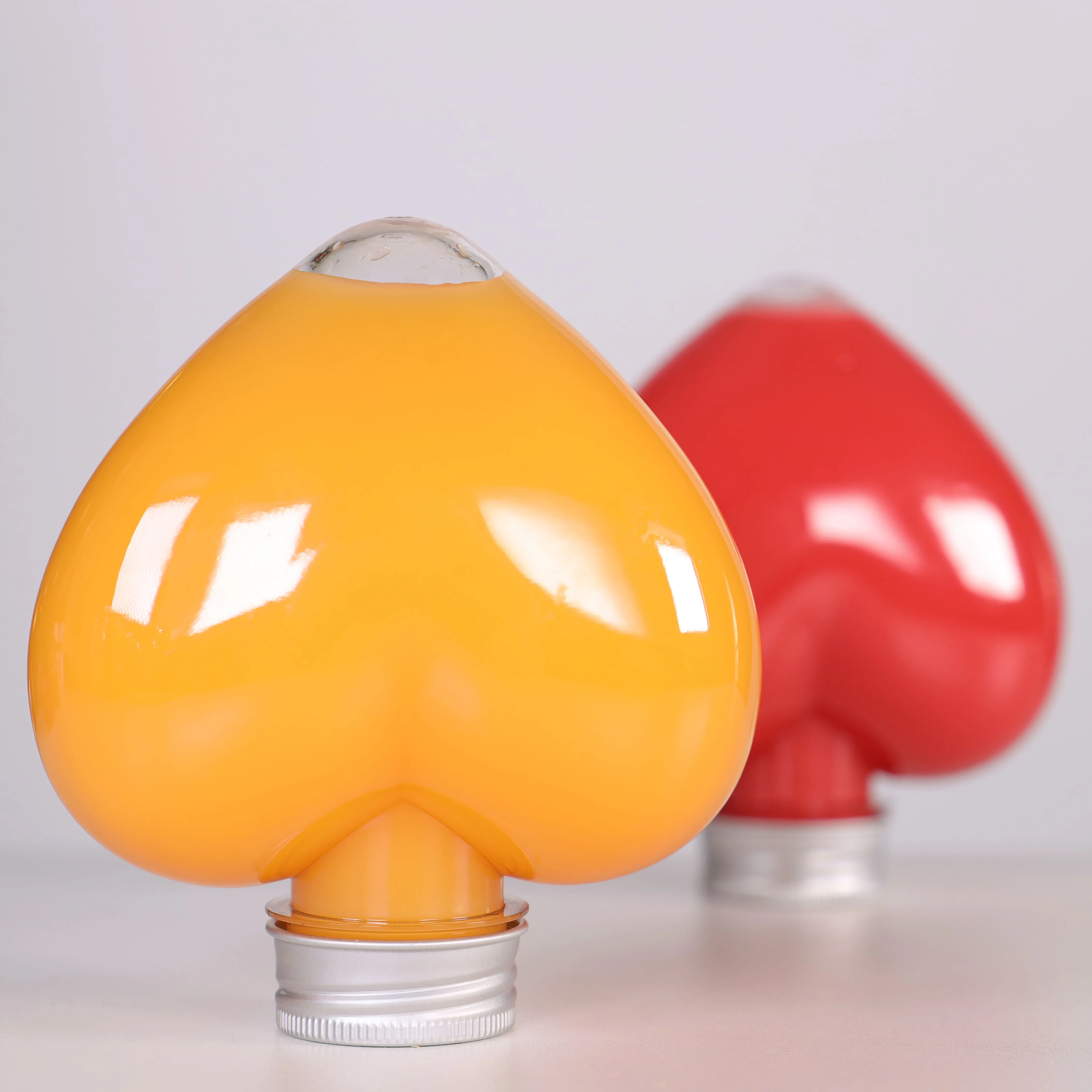 Unique design plastic bottle manufacturers heart shaped pet bottle 350ml