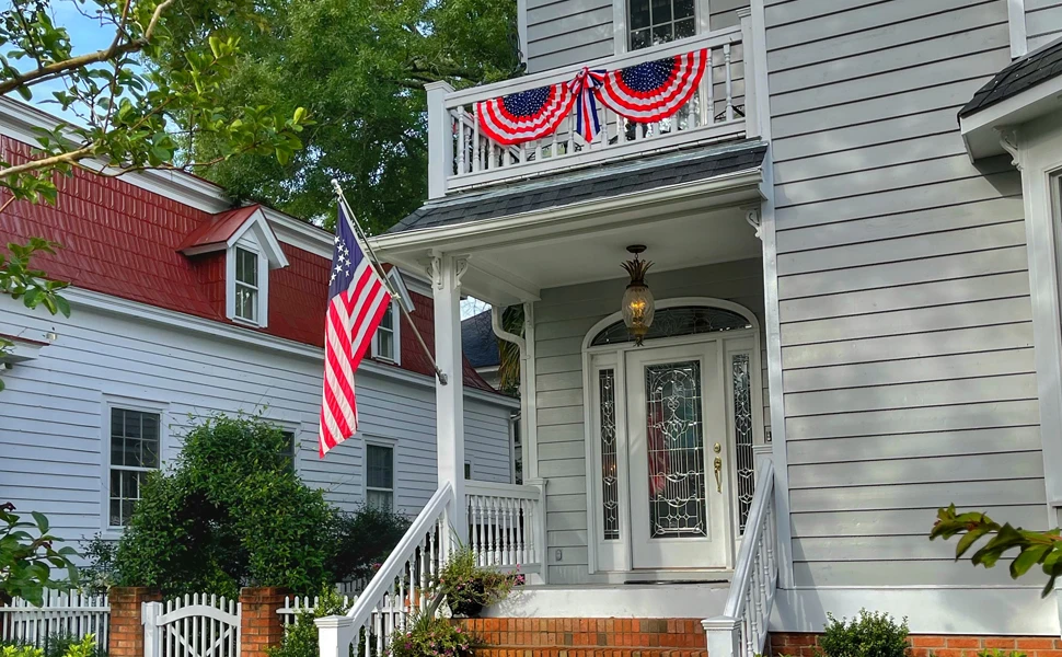 6ft metal outdoor wall mounted flagpole with 2 tangle free ball bearing rings and aluminum base. (Flag not included)