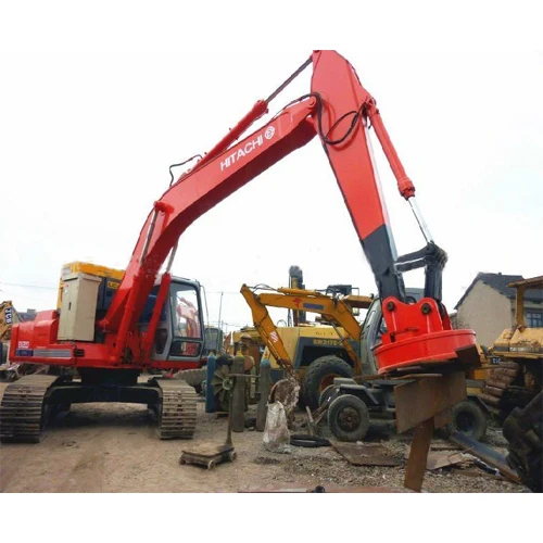 Excavator with Scrap Handling Magnet