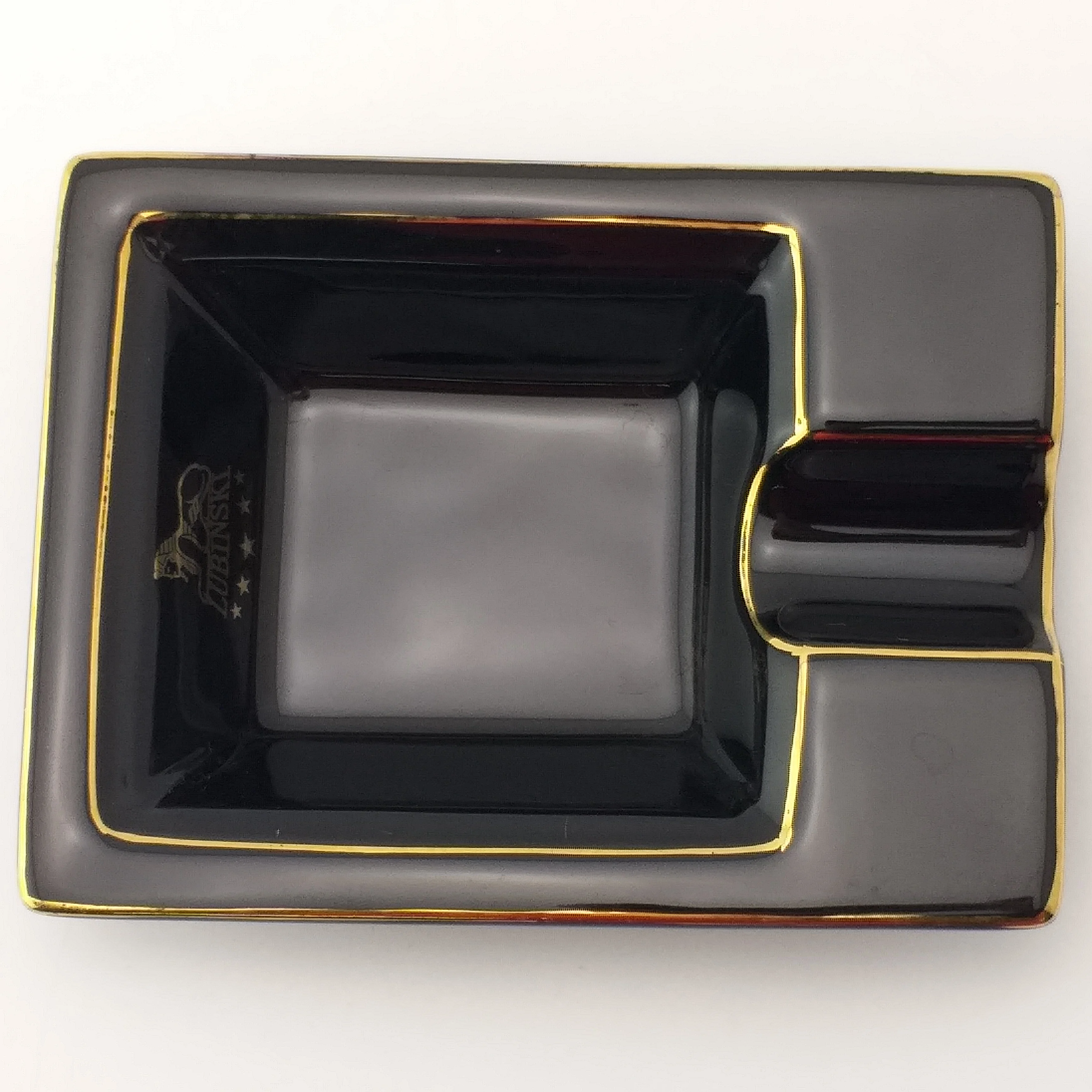 
Best selling black ceramic ashtray with golden edge with one rest with customized logo for sale 