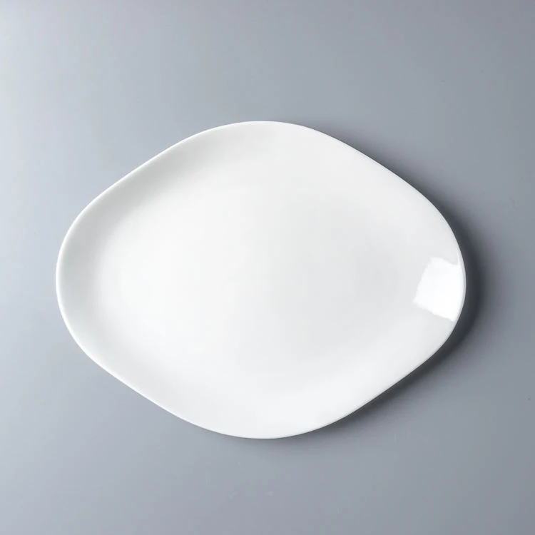 OEM 8/10/12/14Inch Food Grade Material White Oval Ceramic Plate Dinnerware For Star Restaurant Hotel