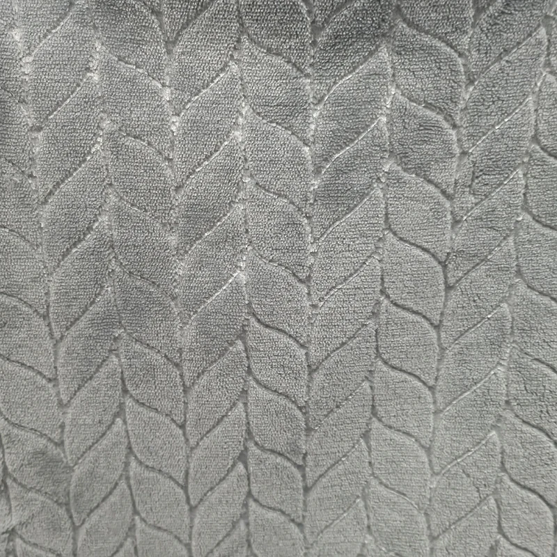 Wholesale Embossed Solid Color Knitting 100% Polyester Flannel Fleece Fabric for Clothes Garment Bed Linings