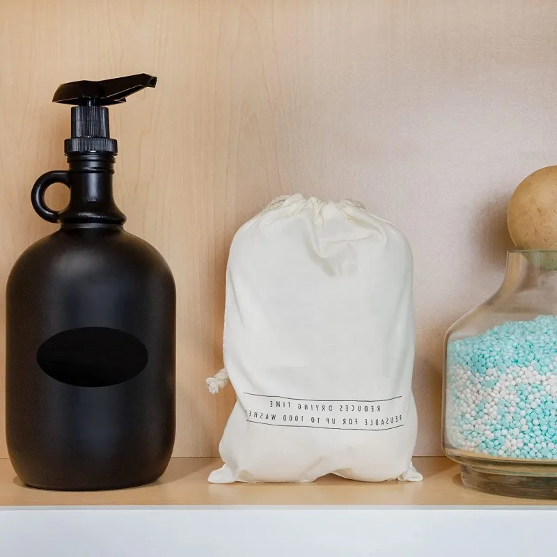 Wholesale matte black 2L 64oz Kitchen Condiment Glass Syrup Sauces Honey Liquid Dispenser For Kitchen With Food Grade Black Pump