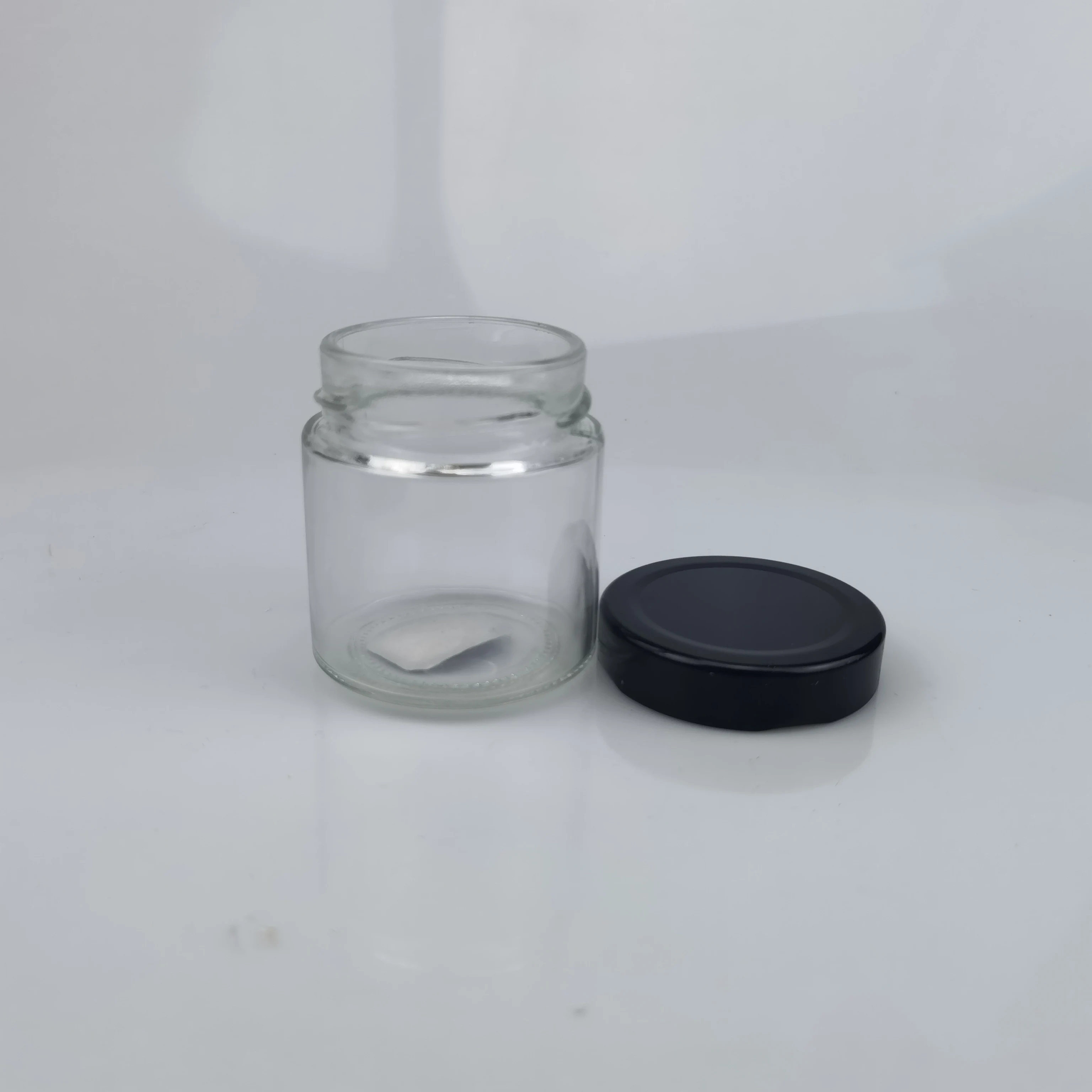 Factory price 100ml 140ml 180ml 200ml 220ml 280ml 212ml Round Shape Ergo Honey Glass Jar with Twist Metal Lid