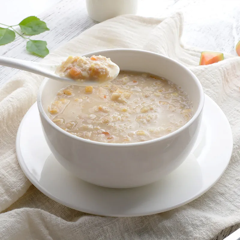 Питание для завтрака с молоком папайя, овсянкой, фруктовыми орехами, хлопьями для завтрака