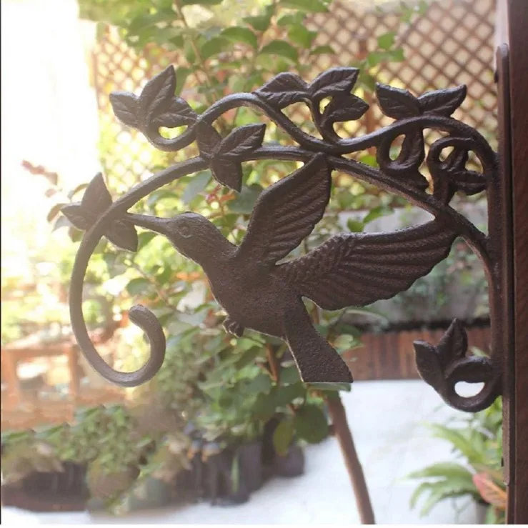 CAST IRON HUMMING BIRD WALL BASKET HOOK