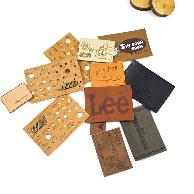 Wholesale Custom leather labels for bags Emboss Leather Labels Metal Logo Leather Patches on Gold Iron for clothes garment