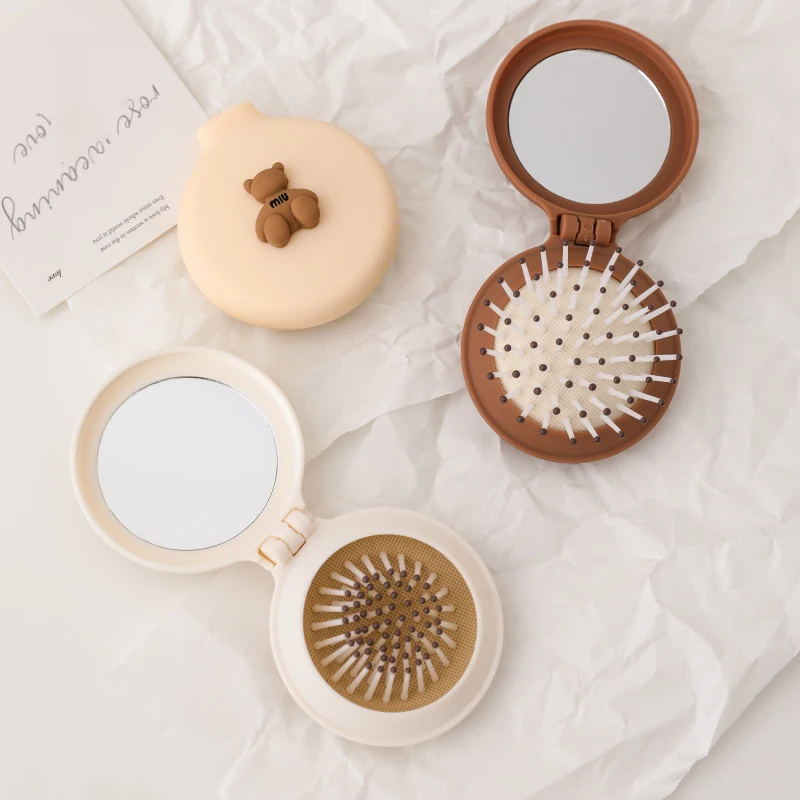 Hot sale portable folding round mirror comb pocket travel comb air cushion massage hair brush with mirror