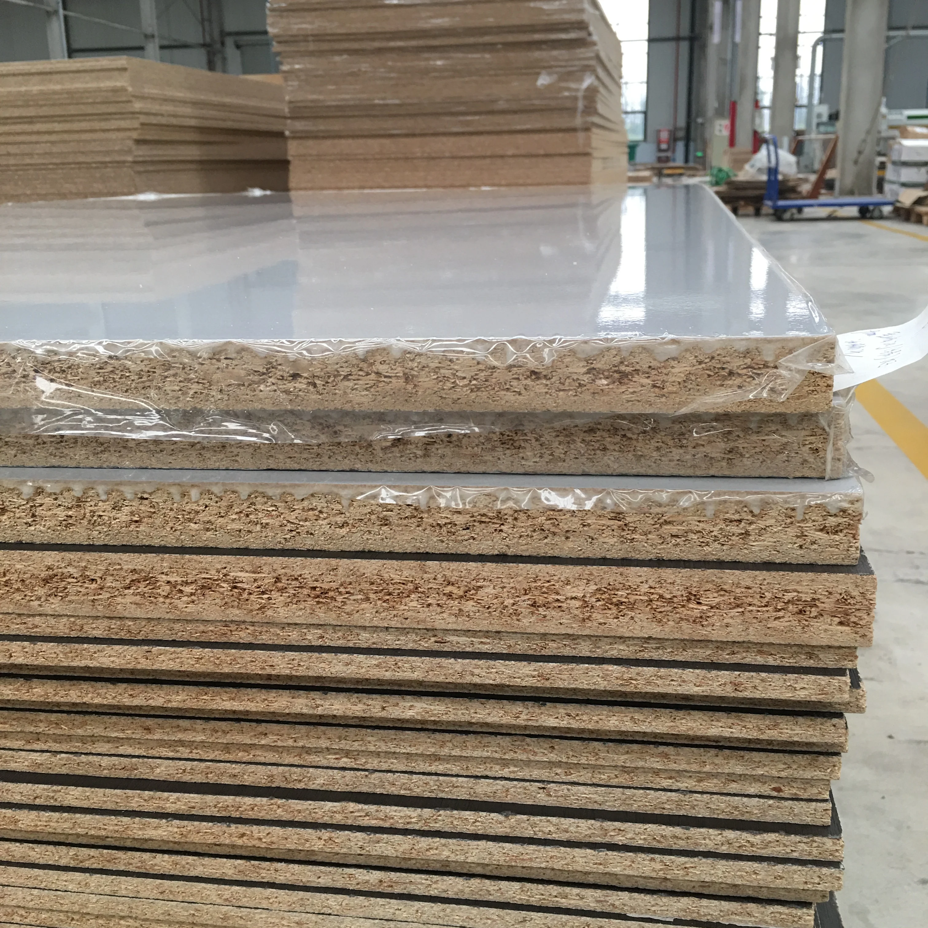 Sales E1 level 1220mmx2440mm  melamine faced high glossy uv mdf particle board
