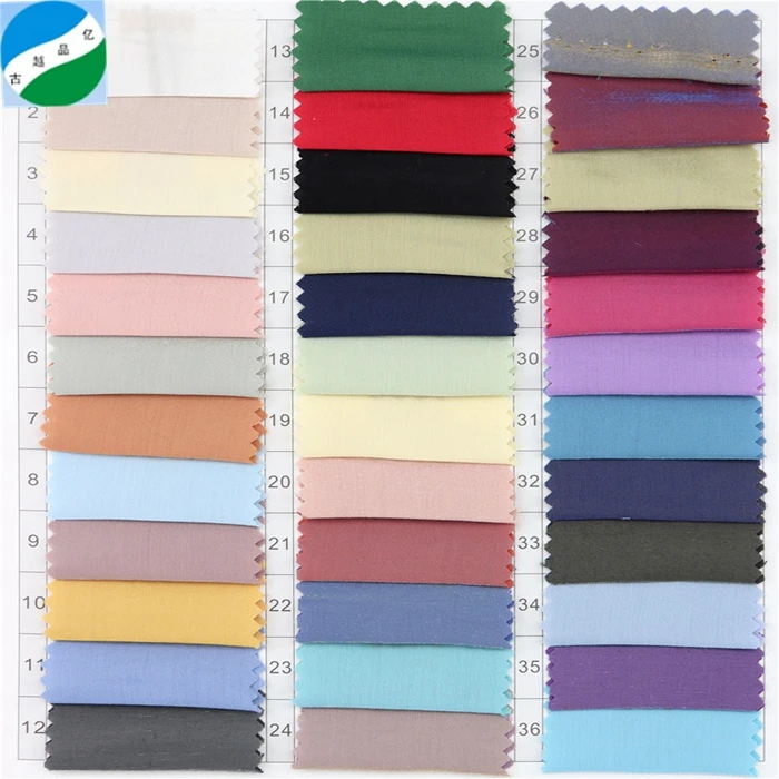 High quality  100% woven rayon and polyester shiny  ready good fabric stock lot for garment