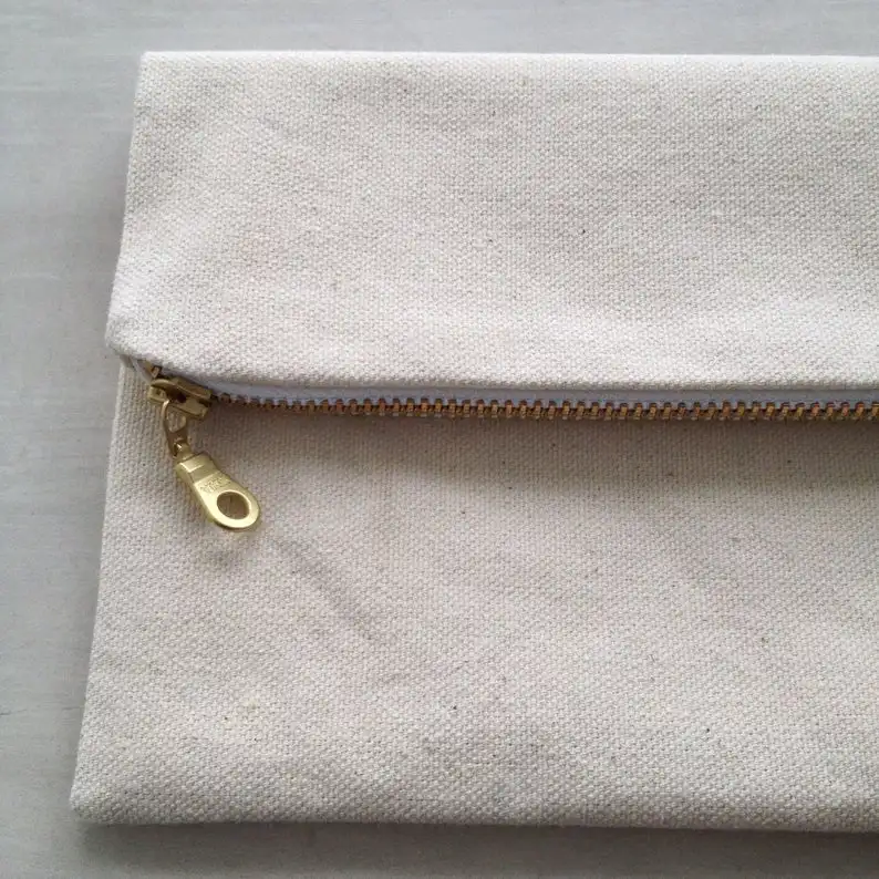 
Canvas Zipper Pouch. Choose between 5 sizes. Natural Cotton Canvas with Gold Zipper. 