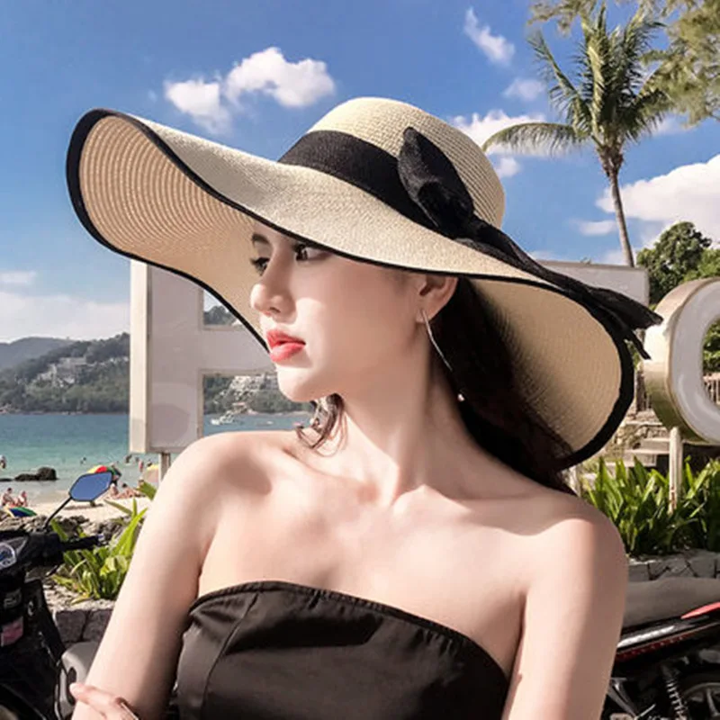 Wholesale Summer Beach Foldable Natural Grass Straw Hat Caps With Bow Big Sun Protection Paper Floppy Panama Straw Beach Hat