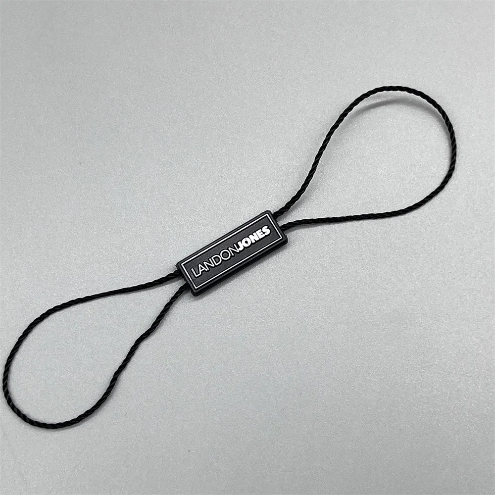 Cheap Customized Embossed Logo  Hangtag Plastic Seal Strings Garment Plastic Rope Seal Hang Tag String Lock For Clothing