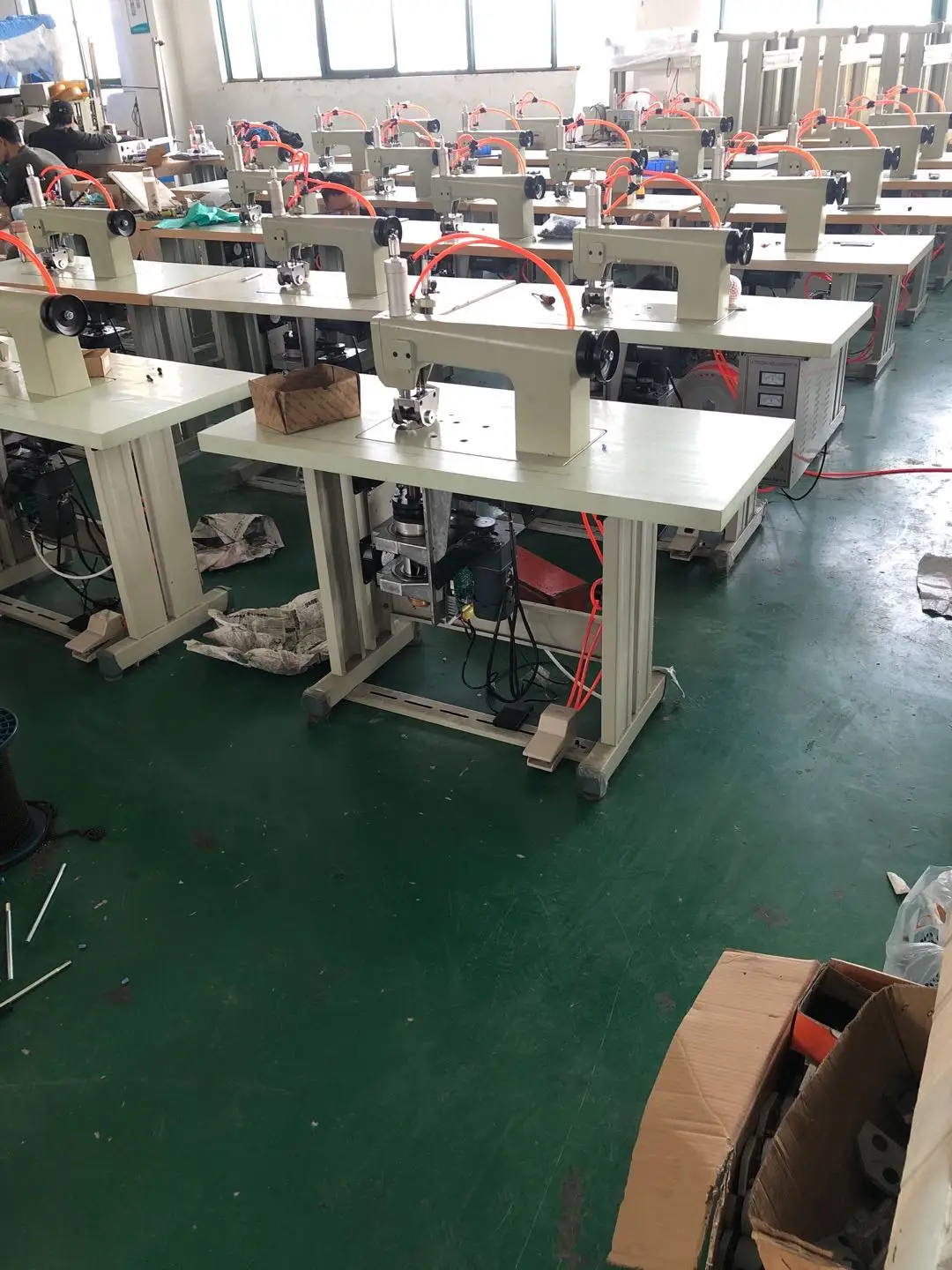 Surgical gown sewing machine