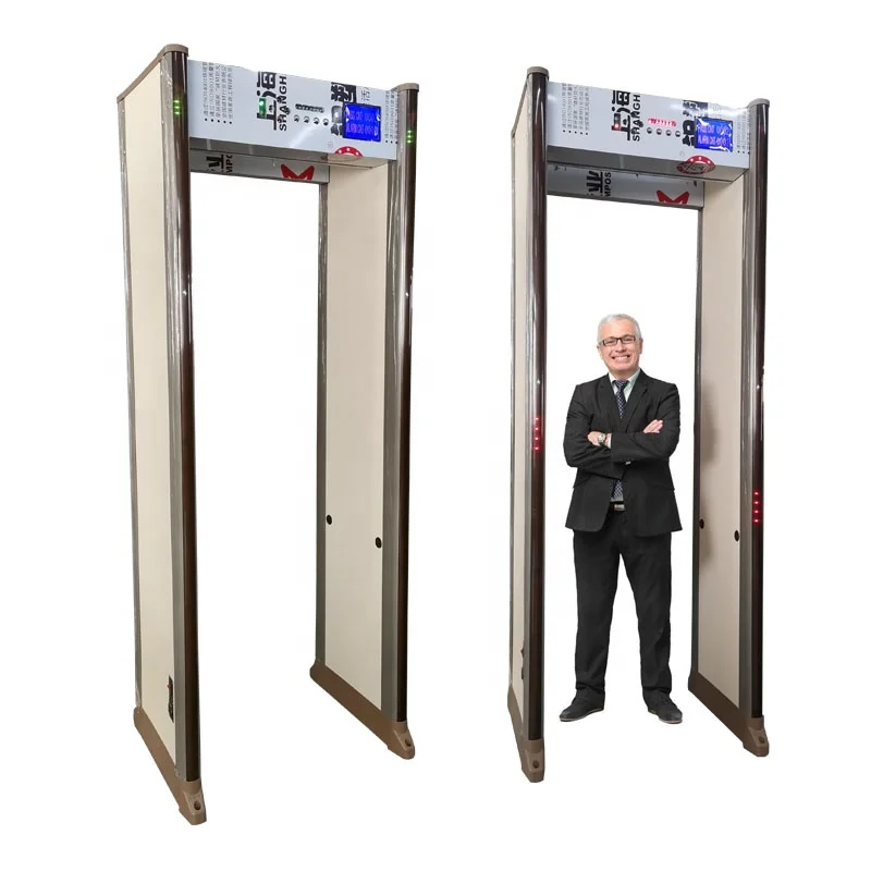 Общественное место Арка Прогулка через дверь металлоискателя для аэропорта, банка, отеля