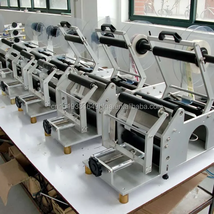 universal use Quality assurance manual labeling machine for oval labeling machine for plastic container multifunction new design 2022