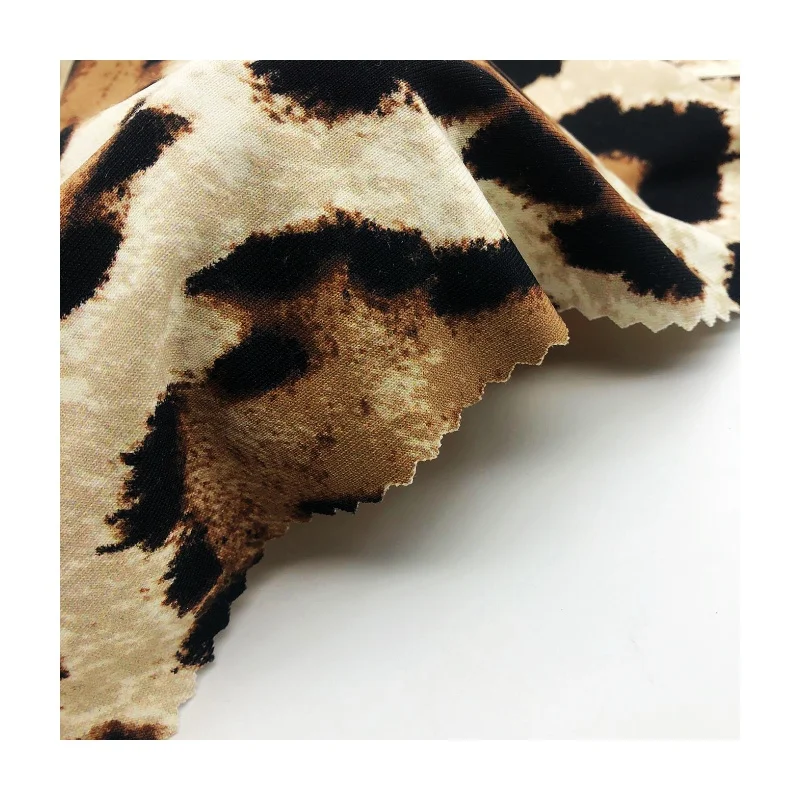Hot sale silky touched 220GSM Good 4-ways stretch nylon spandex Leopard design rotary print jersey fabric for dress