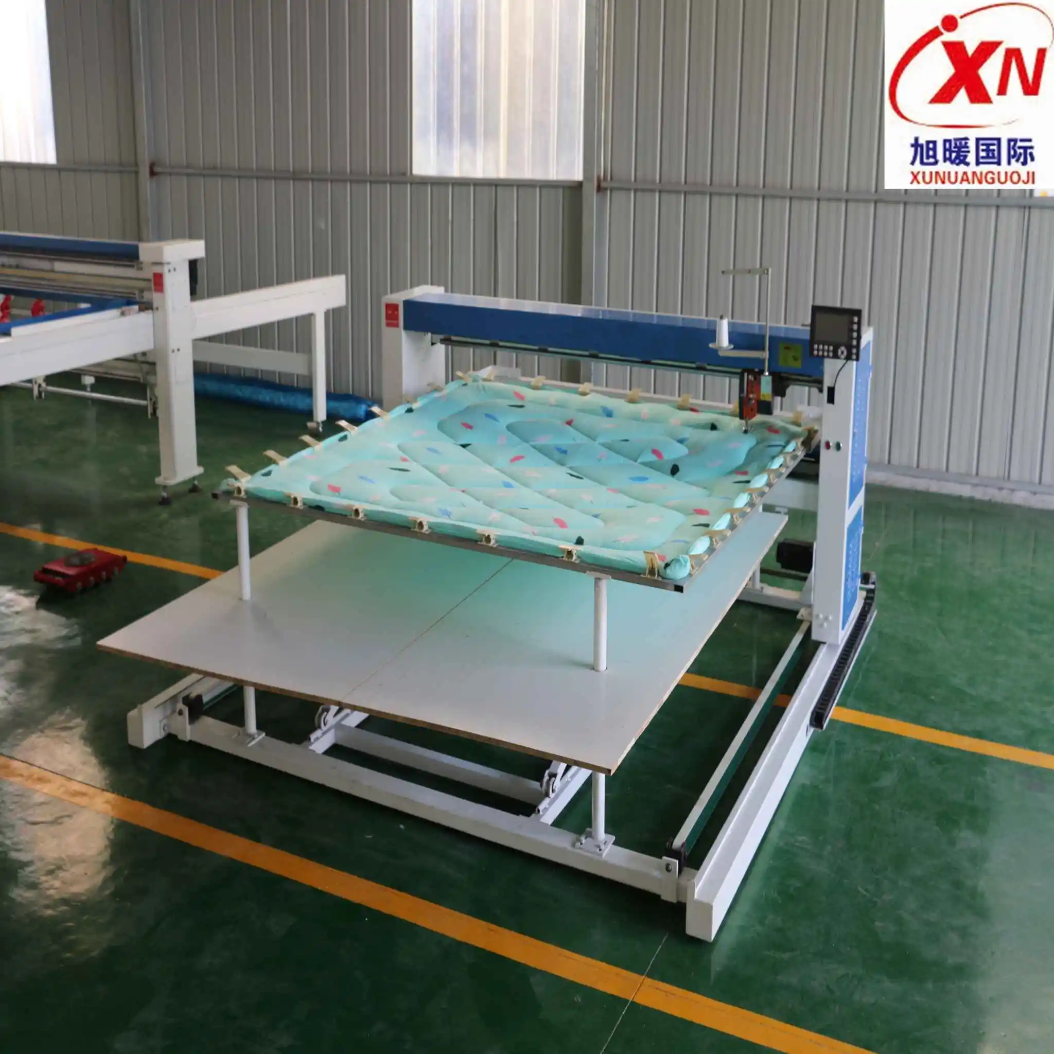 KH-9 computerized lift quilting machine