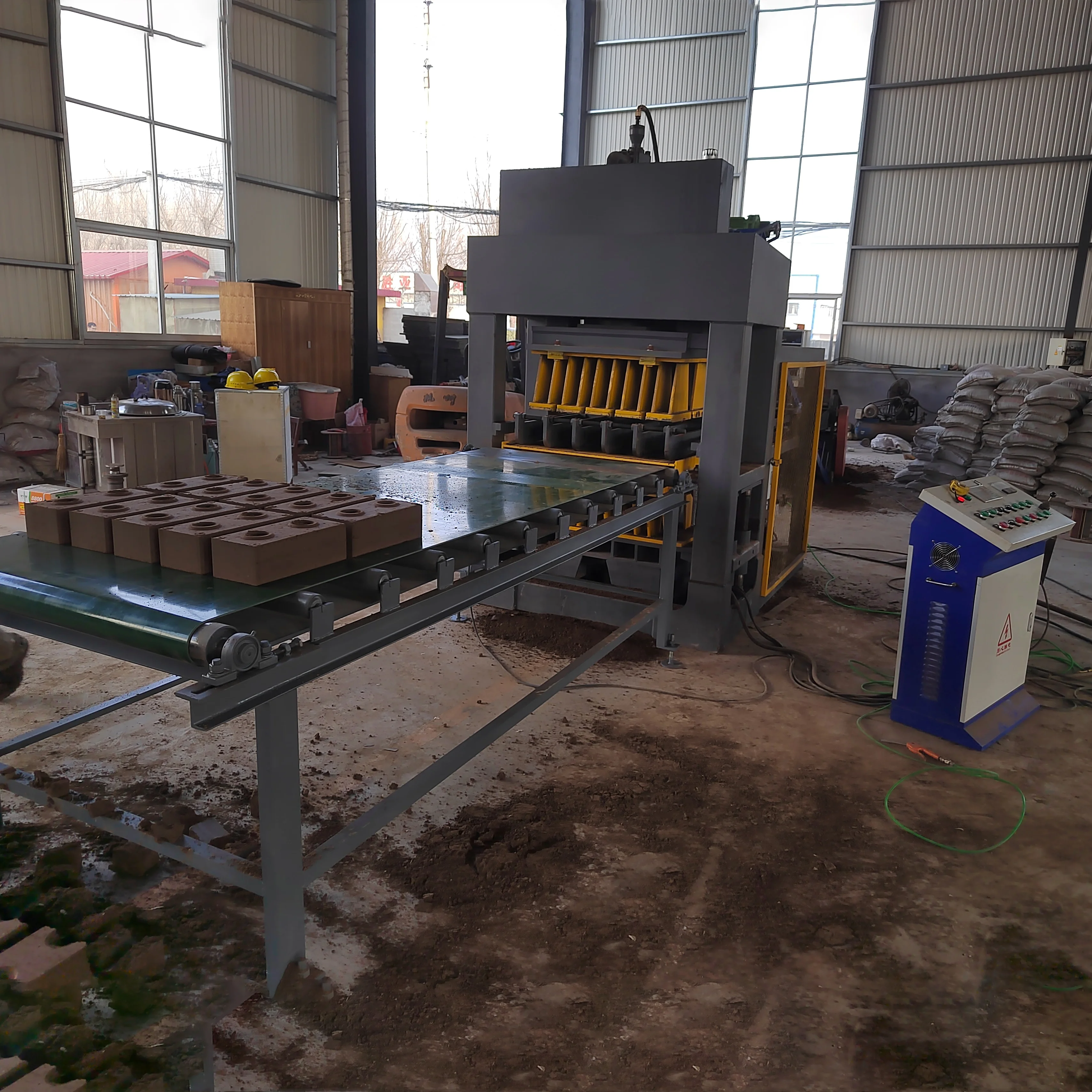 10-10 Hydraulic Interlocking Clay Brick Machine 10-10 Compressed Earth Soil Fly Ash Clay Brick Molding Machine