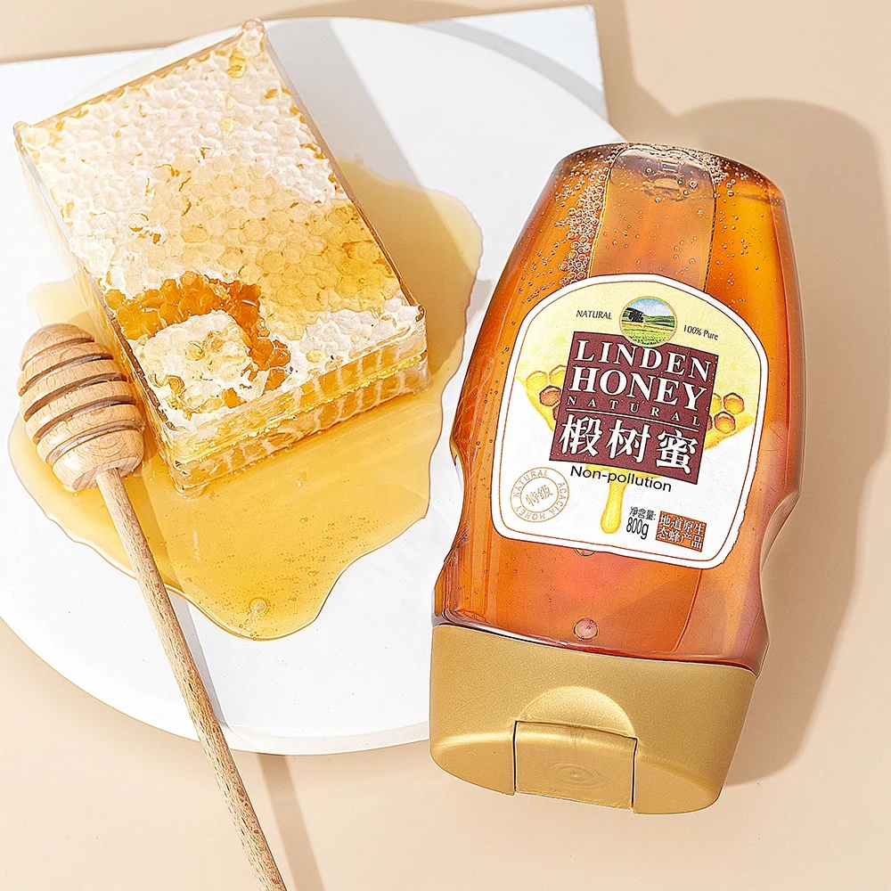 Wholesale plastic transparent honey squeeze bottles plastic bottles for honey packaging honey bottle packaging