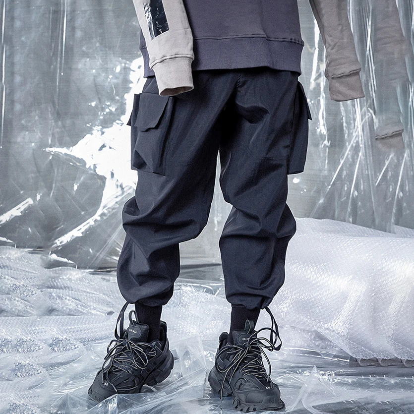 Private Label OEM New Design Women Trousers Waterproof Big Pocket Windbreaker Cargo Nylon Track Men Pants With Tap