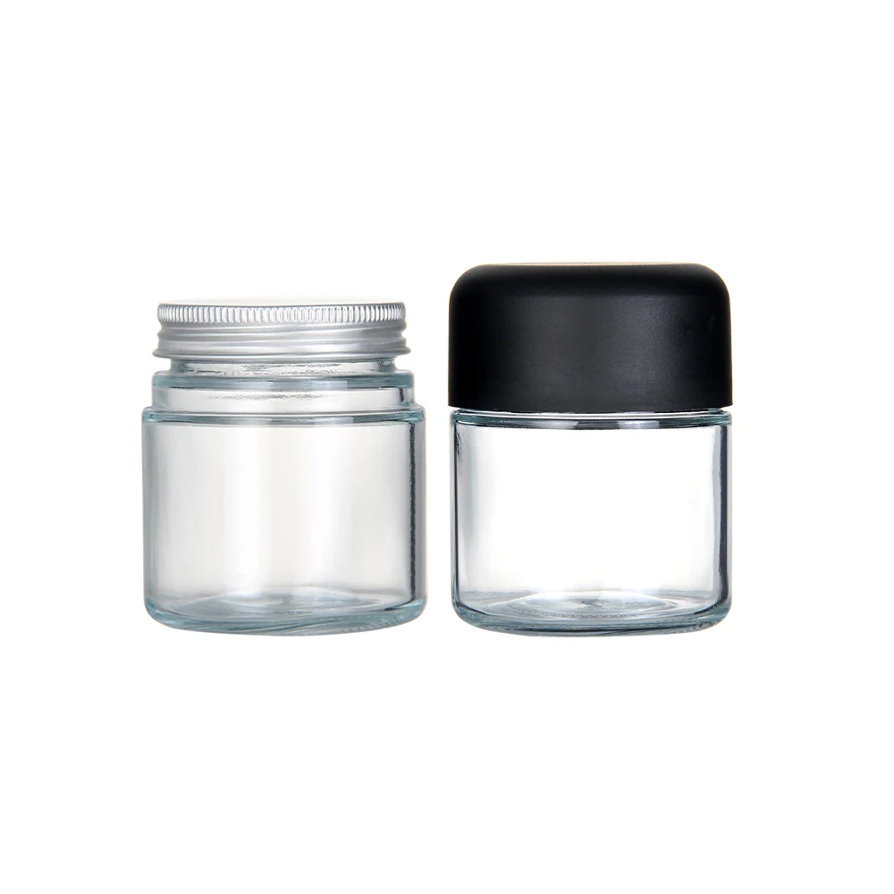 Wholesale 30ml 50ml 100ml empty round container face lotion 1oz face cream glass cosmetic jars with black lids