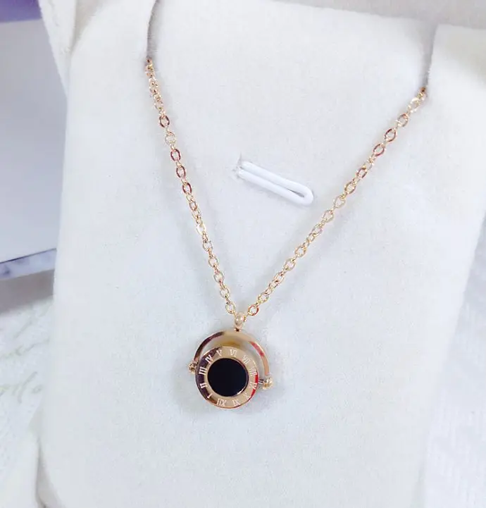 
Titanium steel big circle black and white rotating pendant Korean fashion roman long women sweater thick necklace 