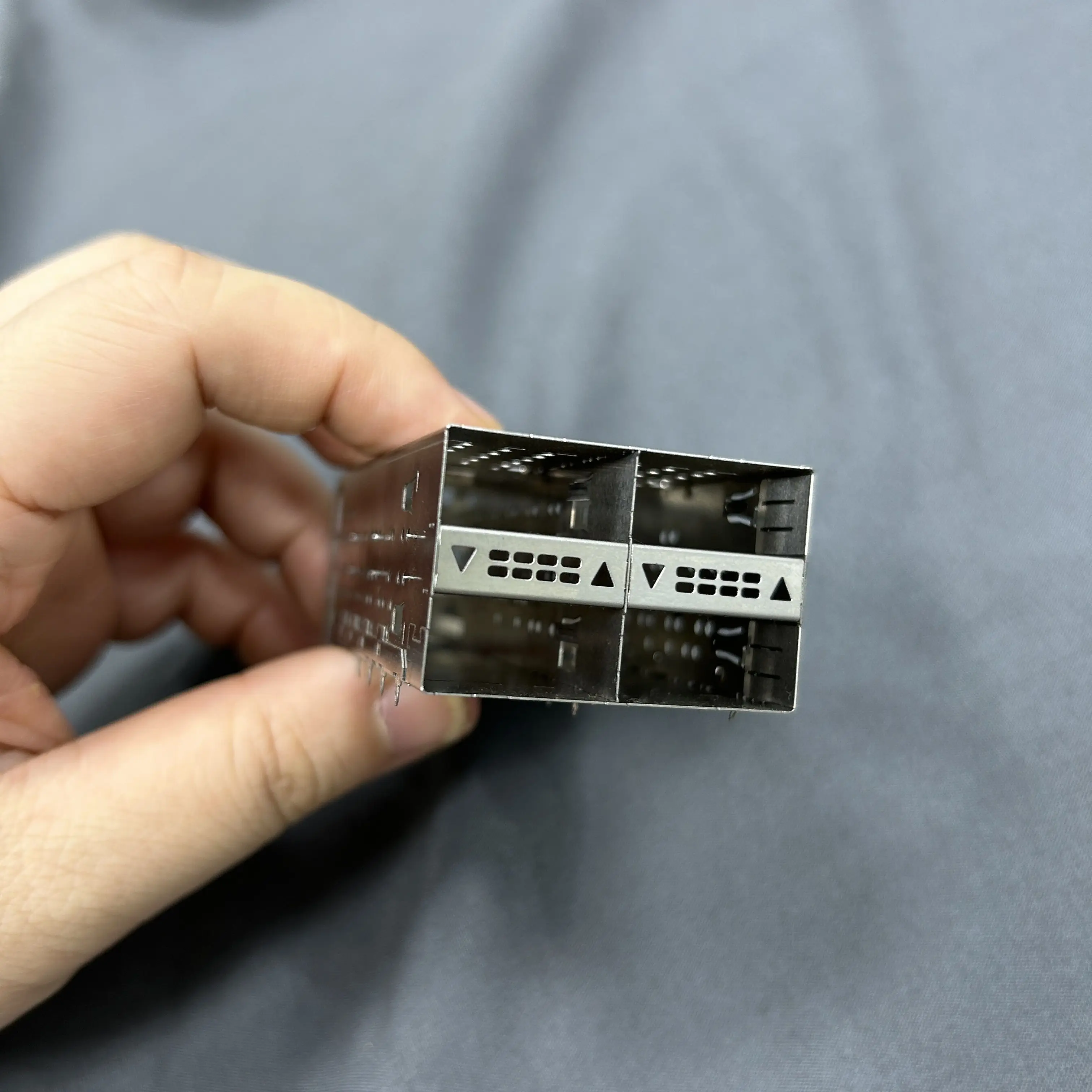 Optical fiber connector module shield cover The optical fiber module has a seat son shield Metal shield crimp pin connector