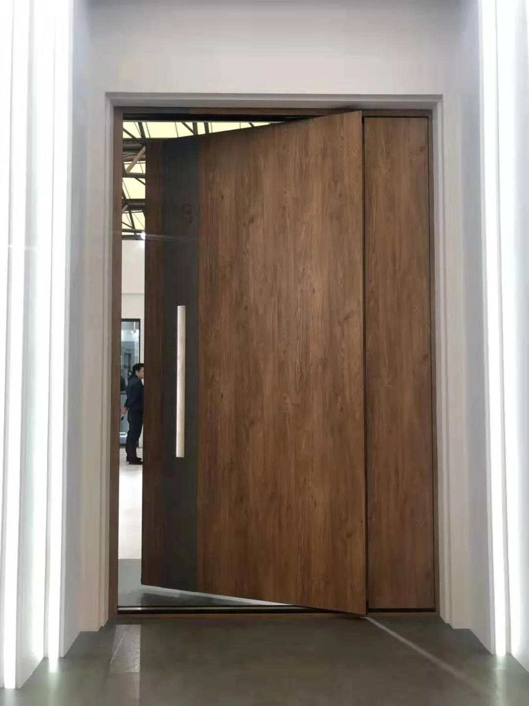 Plain heavy duty pivot solid wooden entrance door for residential