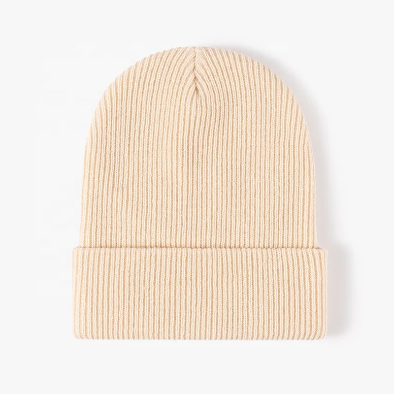 Wholesale in stock unisex plain acrylic colorful winter hats custom woven label tag rubber leather patch thick knitted beanie