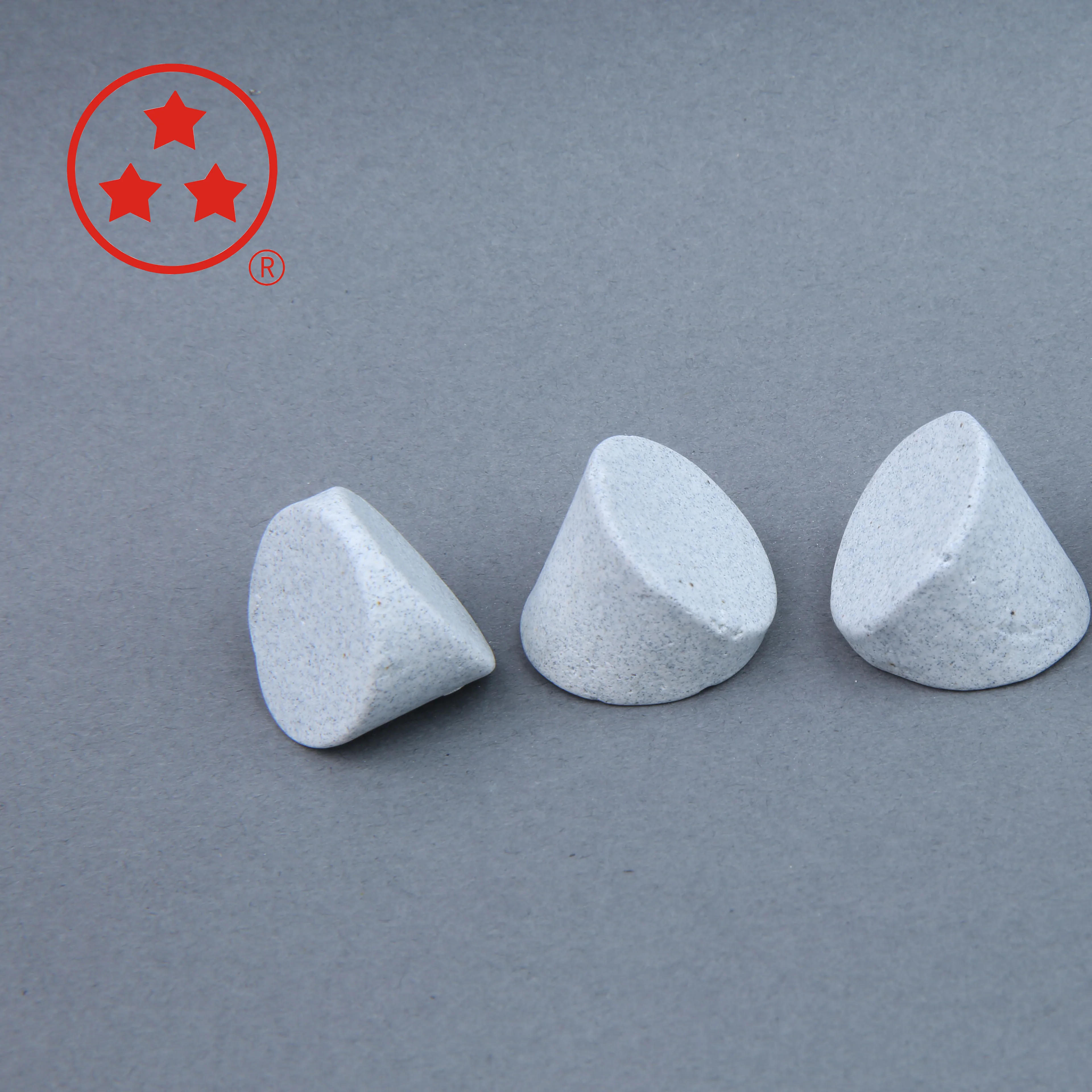 Mass finishing ceramic deburring media