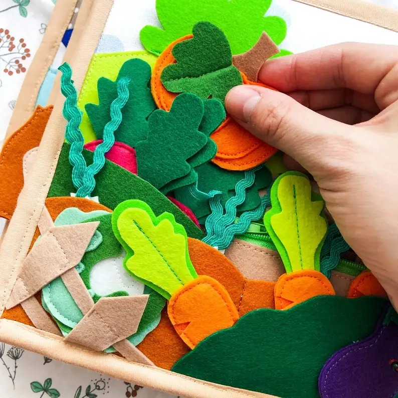 Professional manufacturing in soft baby activity binding silk quiet cloth book education memory for Children